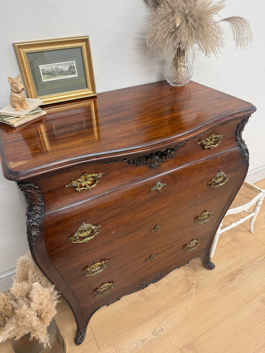 Antique carved chest of drawers