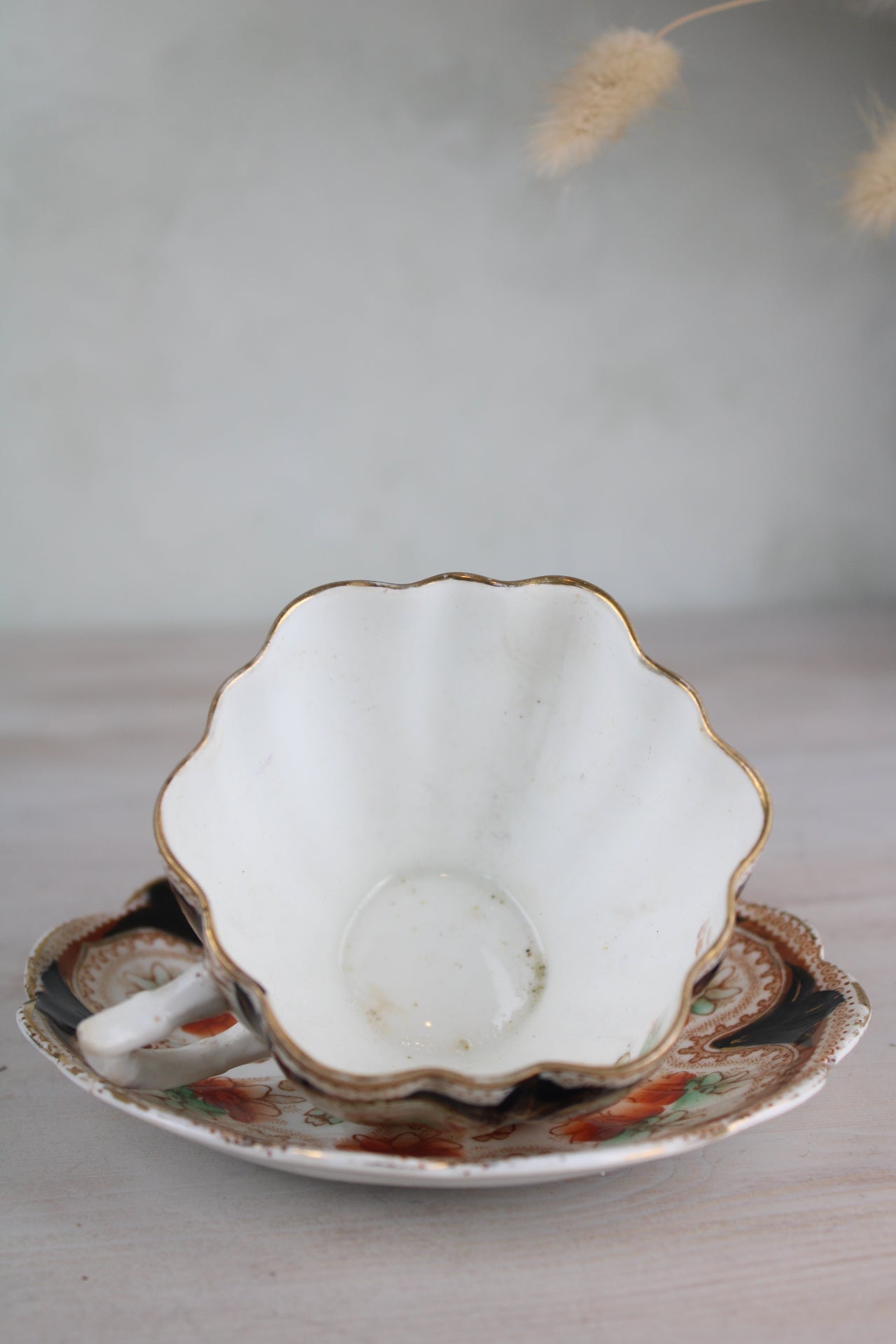Orange and Black Vintage Teacup and Saucer