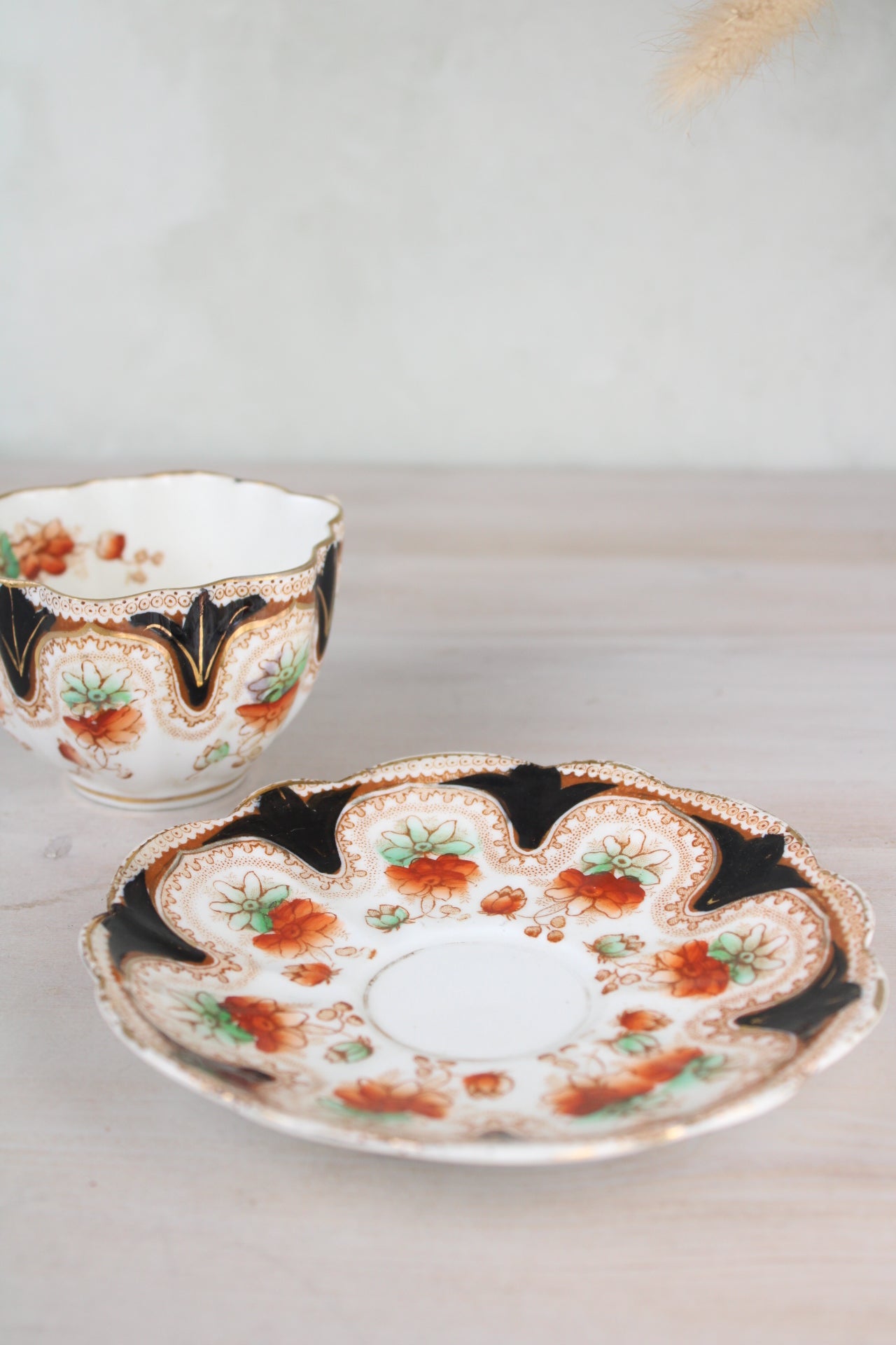 Orange and Black Vintage Teacup and Saucer