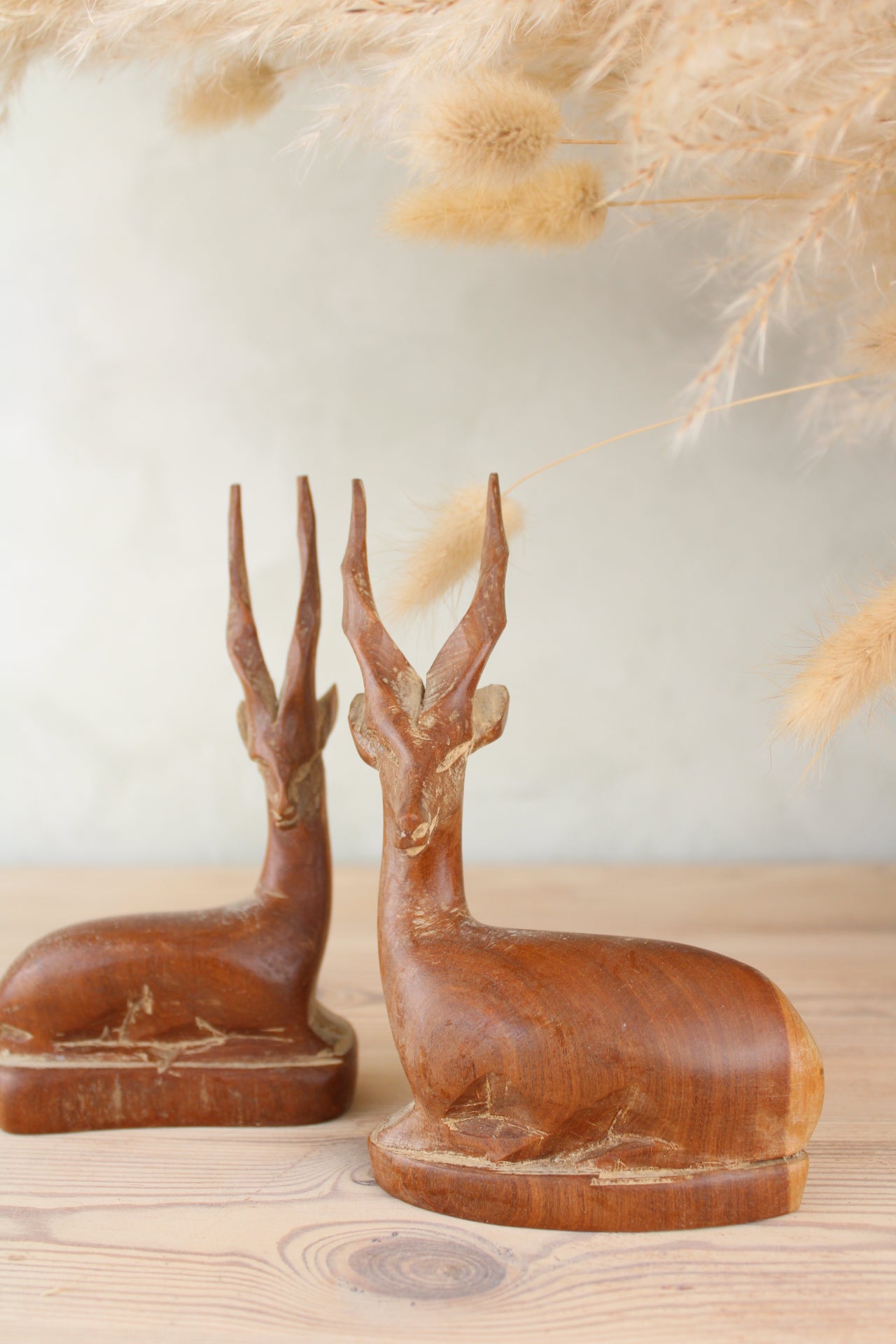 Pair of Sitting Wooden Stags