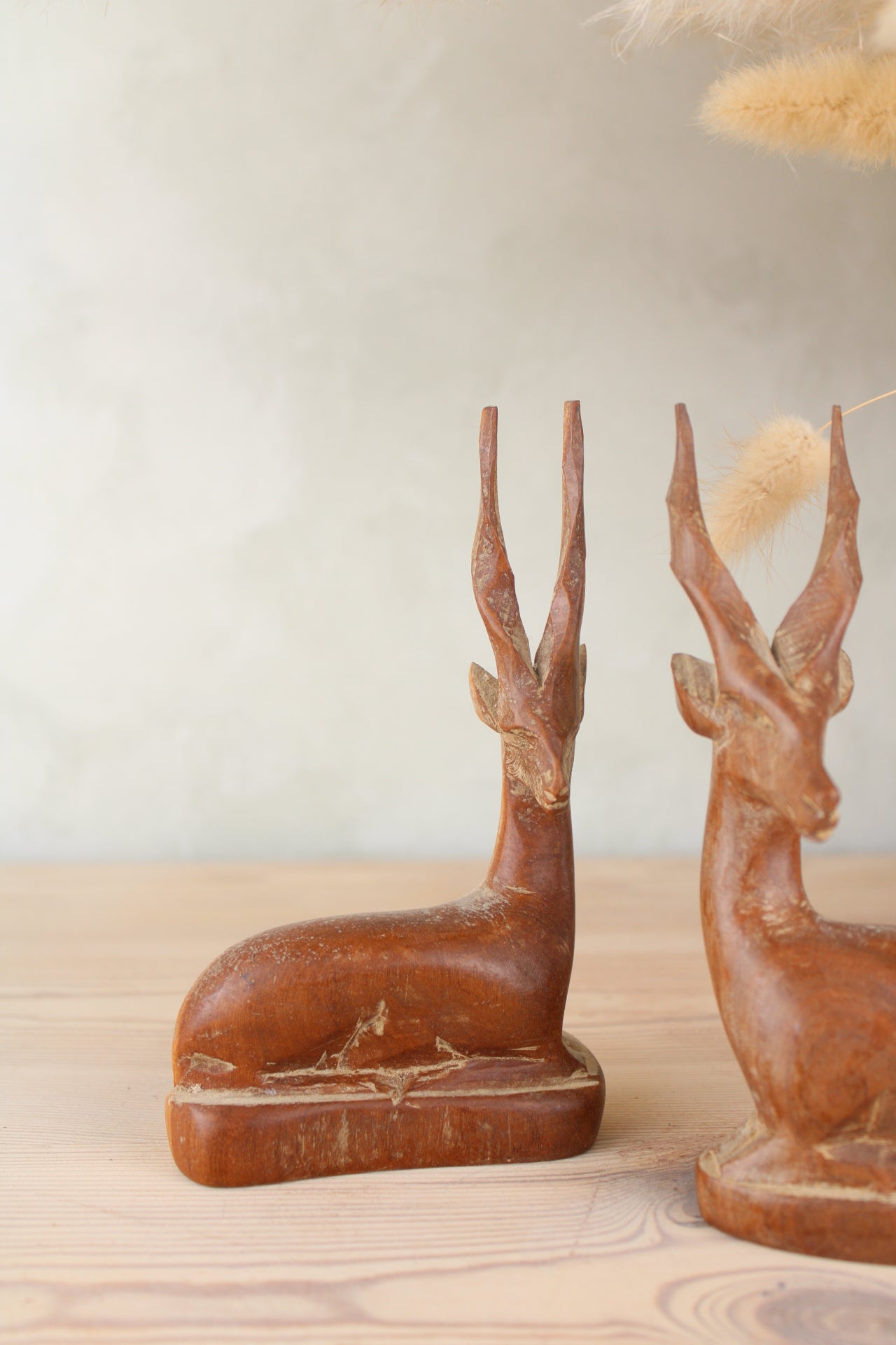 Pair of Sitting Wooden Stags