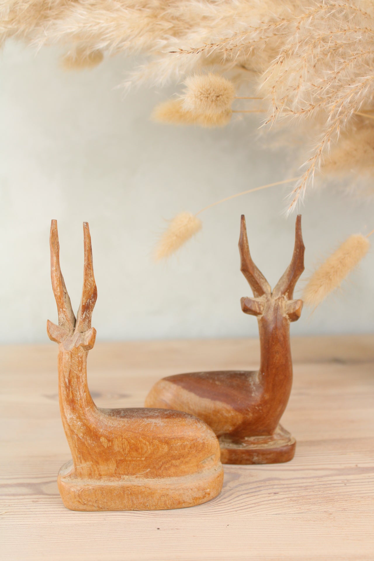 Pair of Sitting Wooden Stags