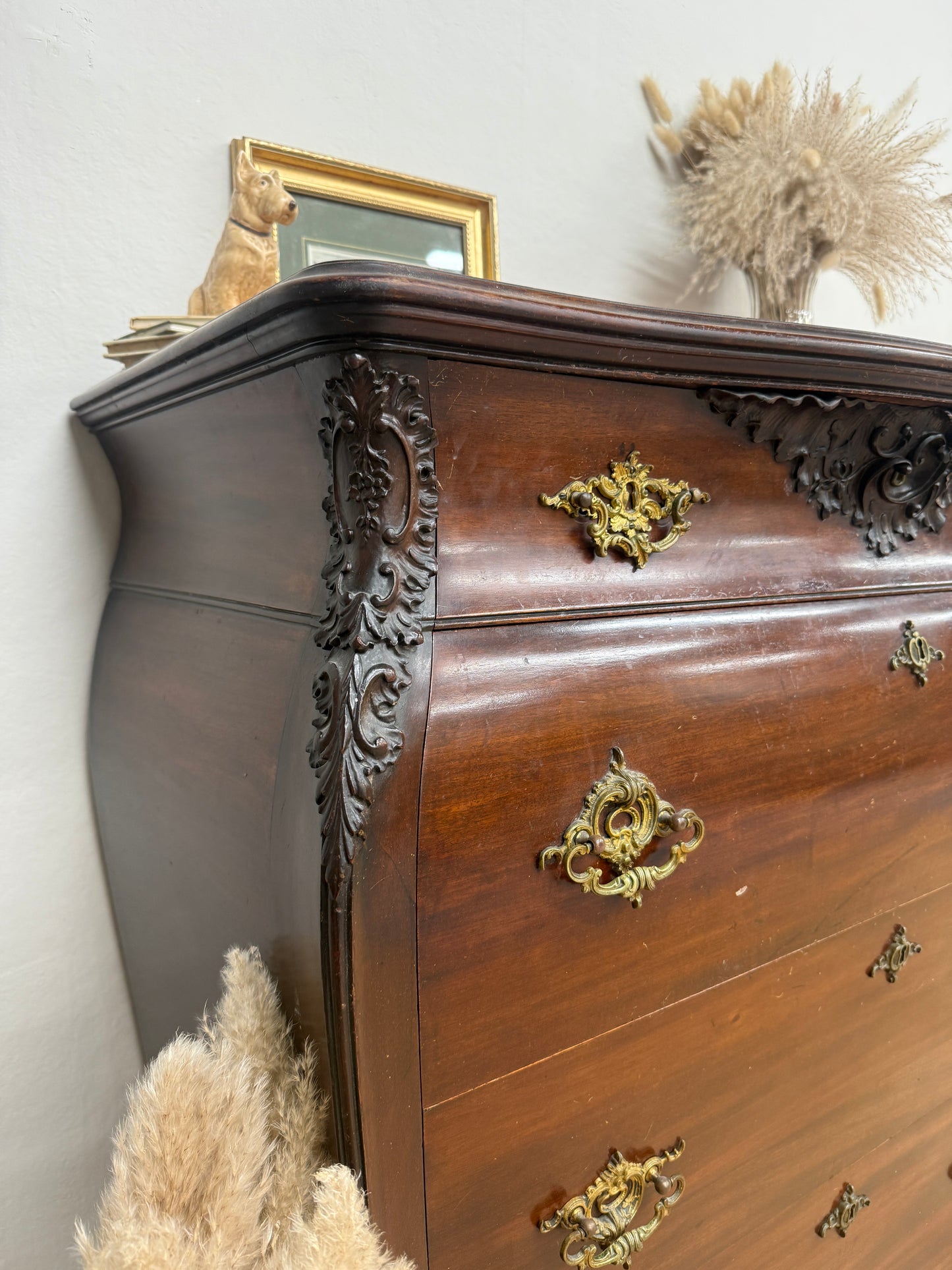 Antique carved chest of drawers