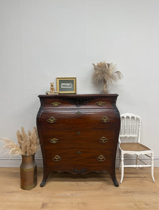 Antique carved chest of drawers