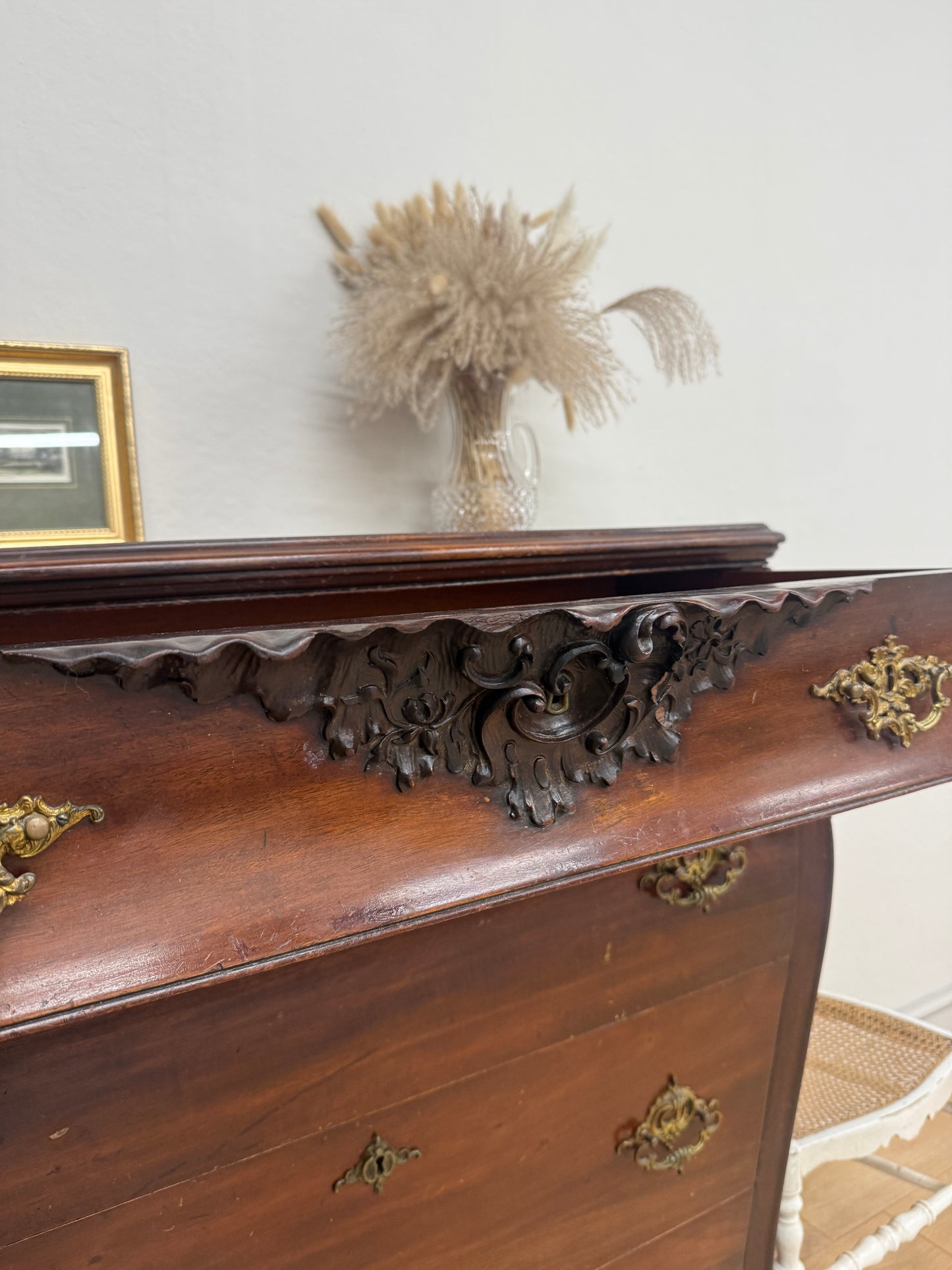 Antique carved chest of drawers