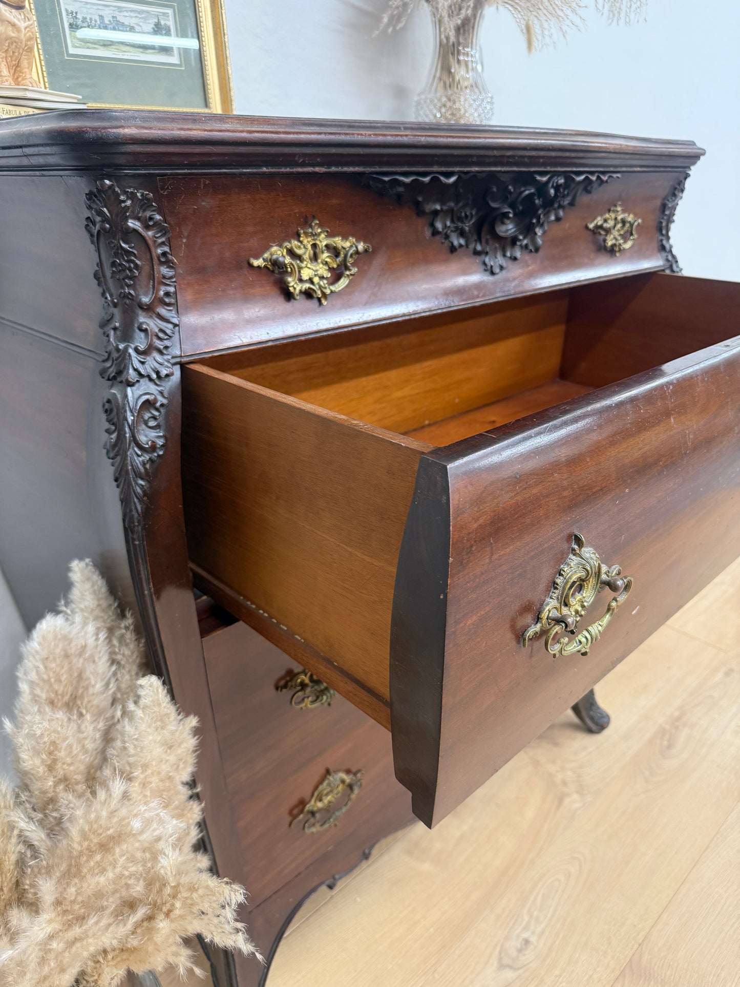 Antique carved chest of drawers