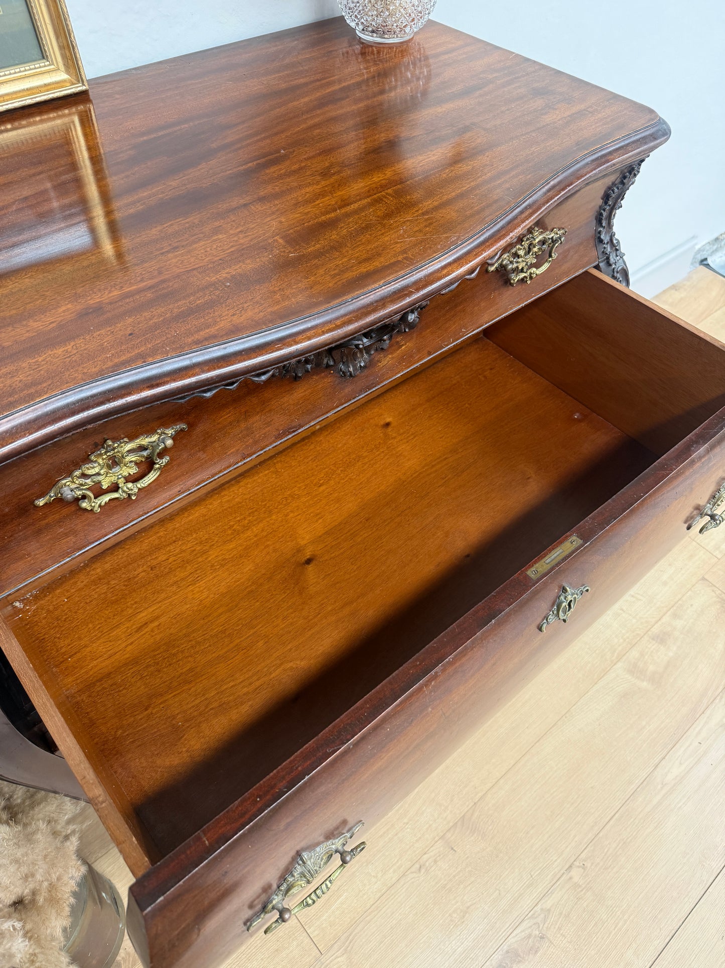 Antique carved chest of drawers