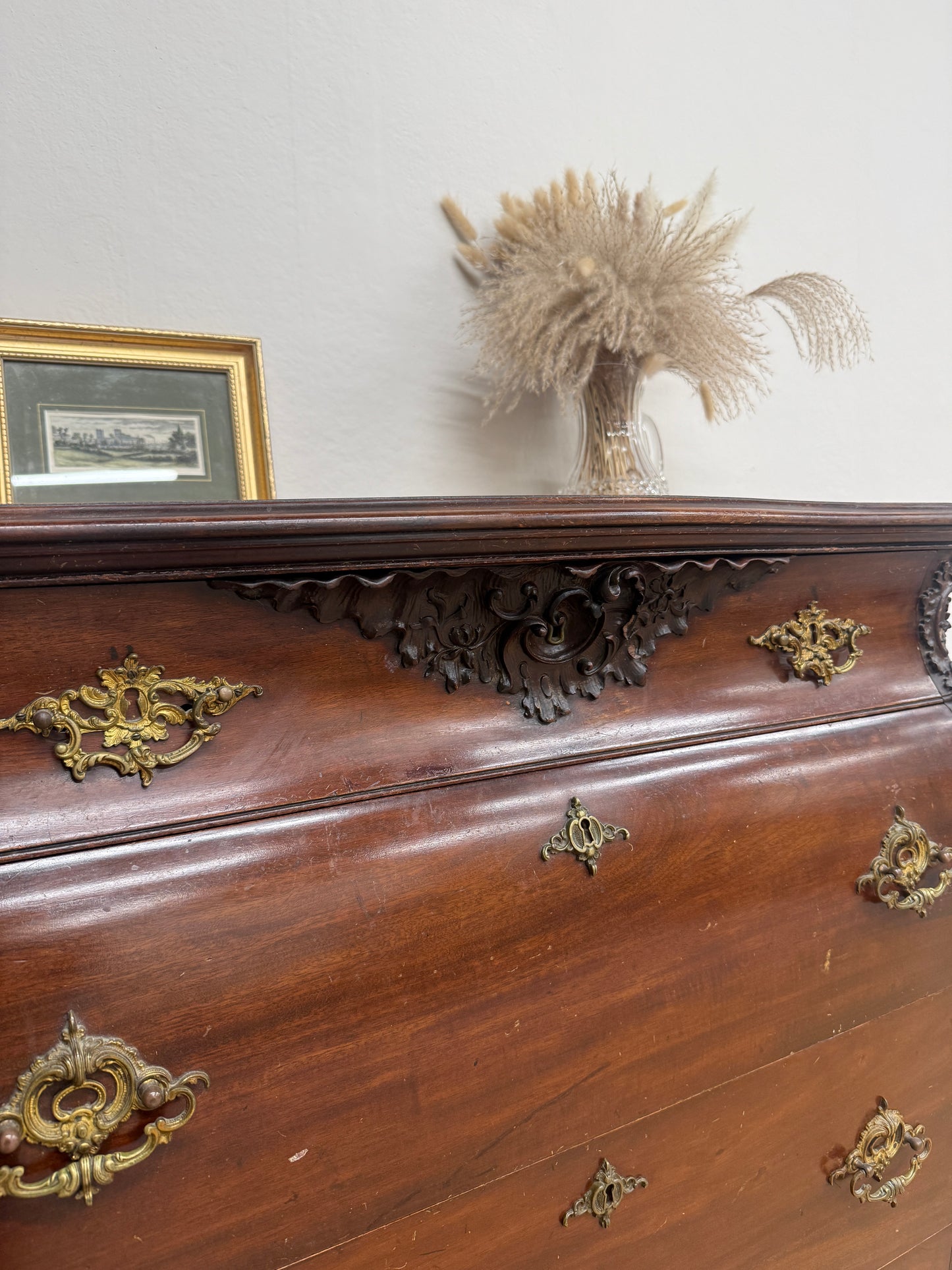 Antique carved chest of drawers