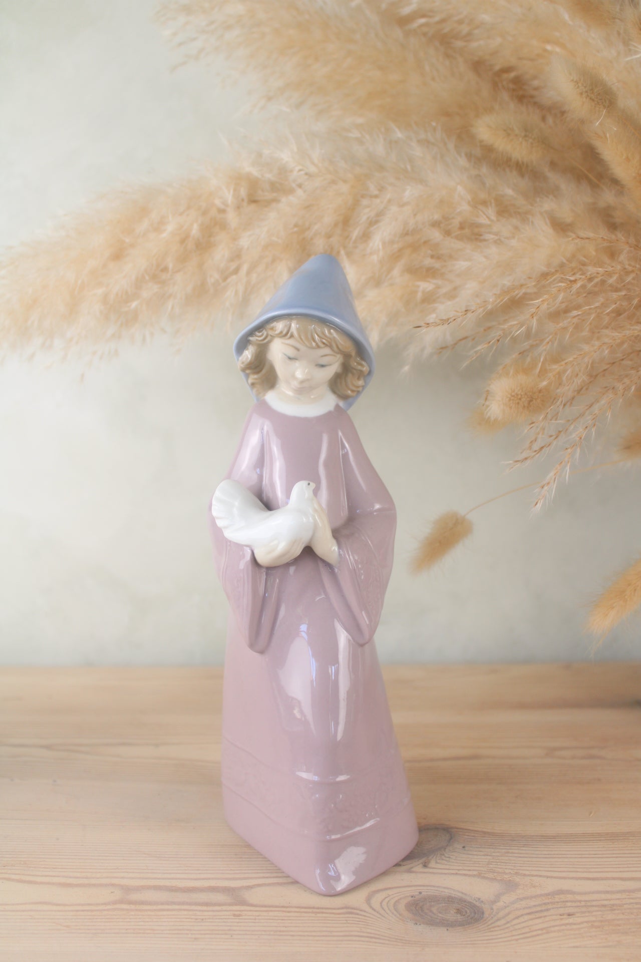 Nao Lladro Woman Holding a Bird Figurine