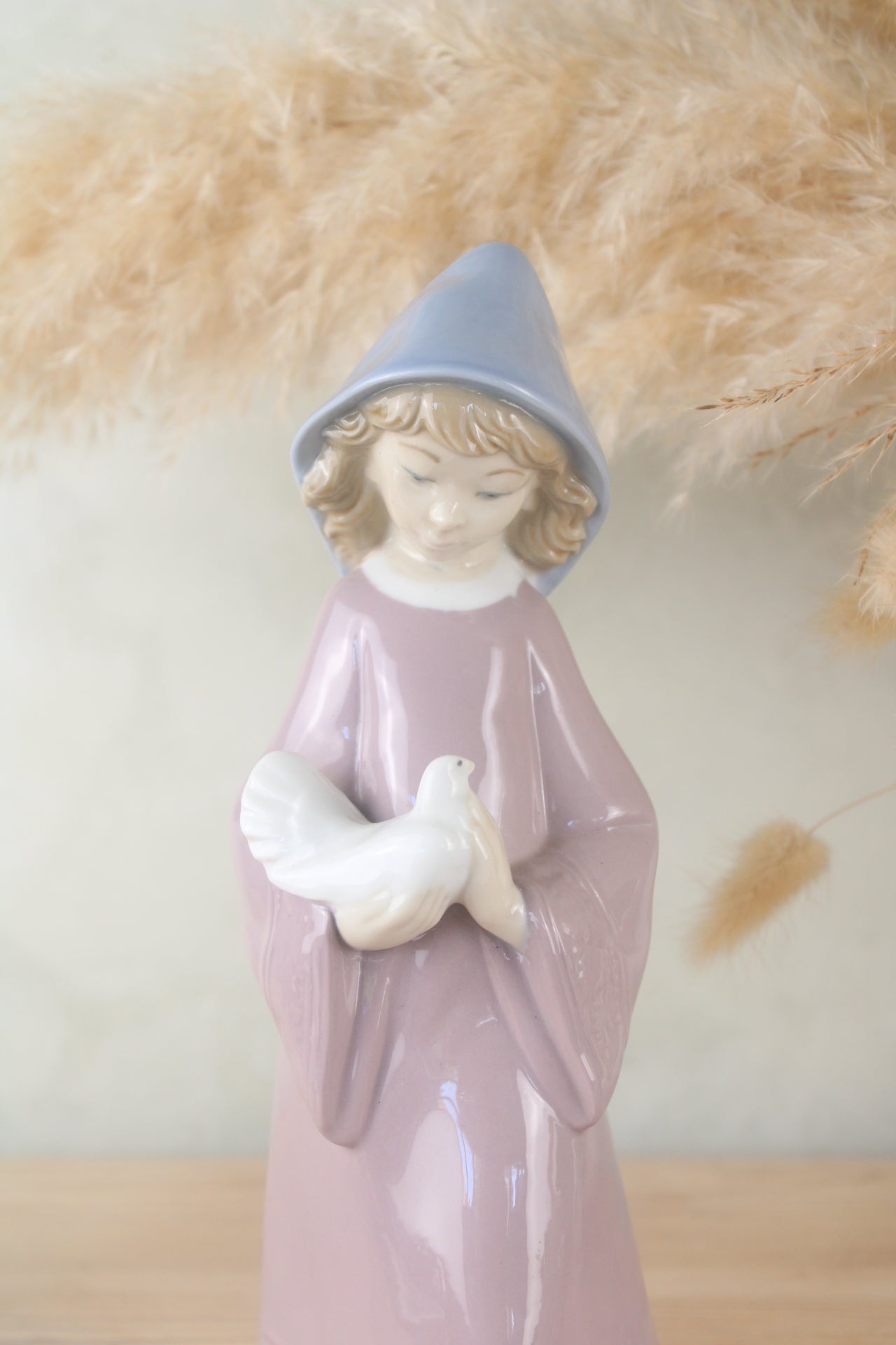 Nao Lladro Woman Holding a Bird Figurine