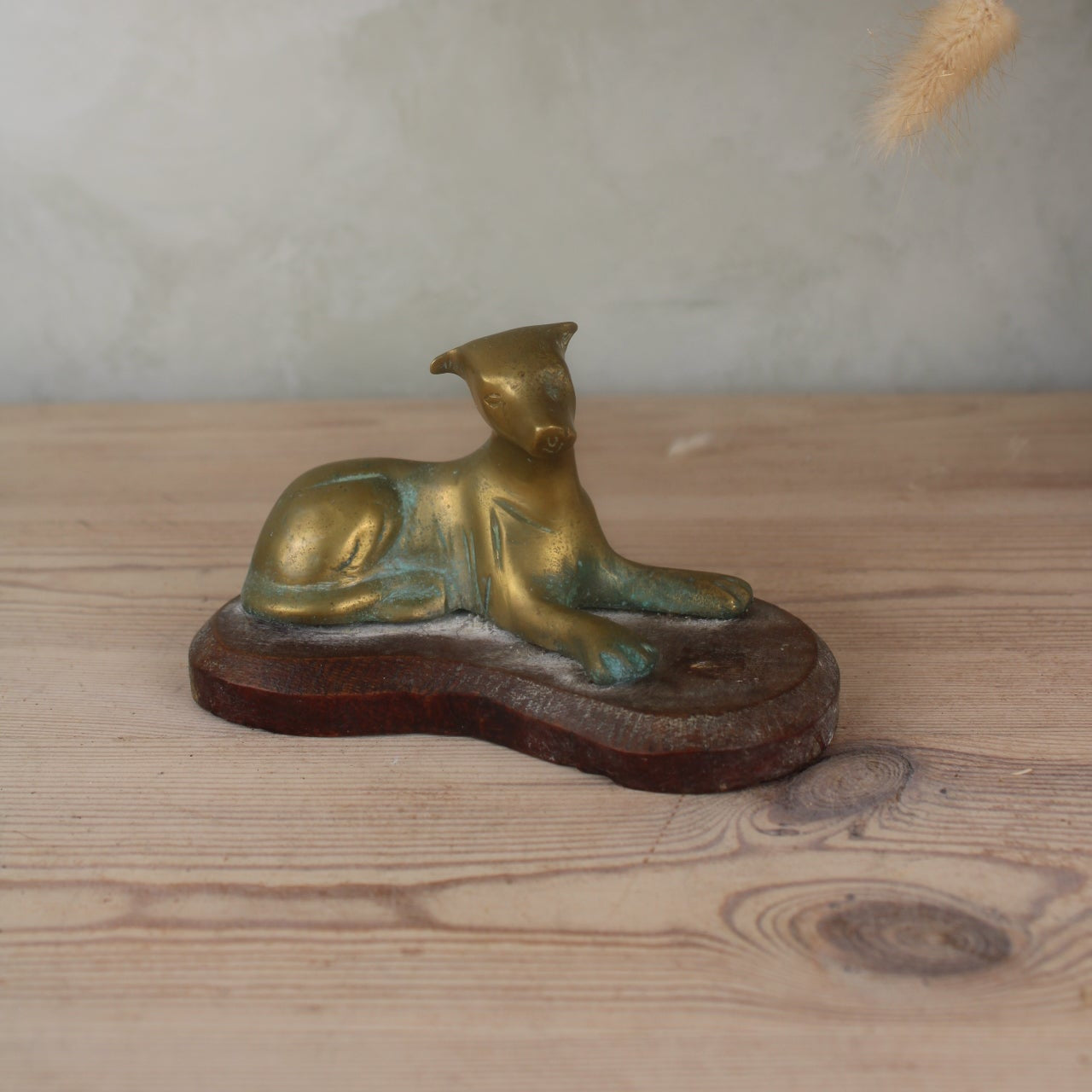 Brass Dog on a Wooden Base