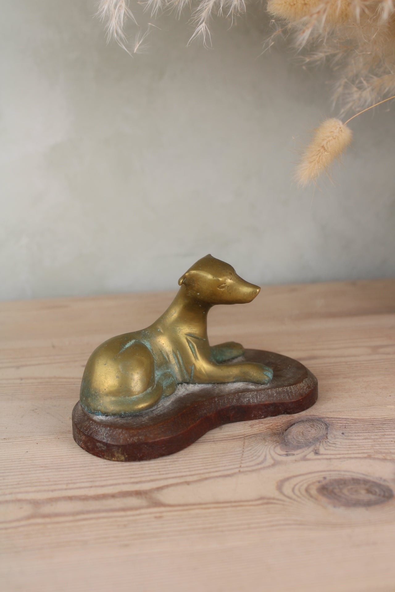 Brass Dog on a Wooden Base