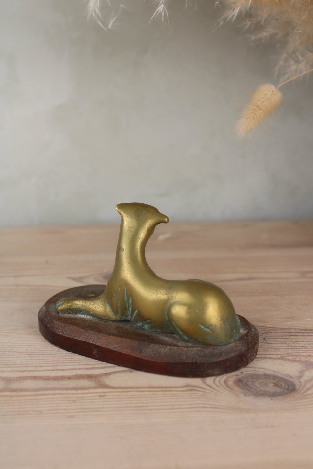 Brass Dog on a Wooden Base