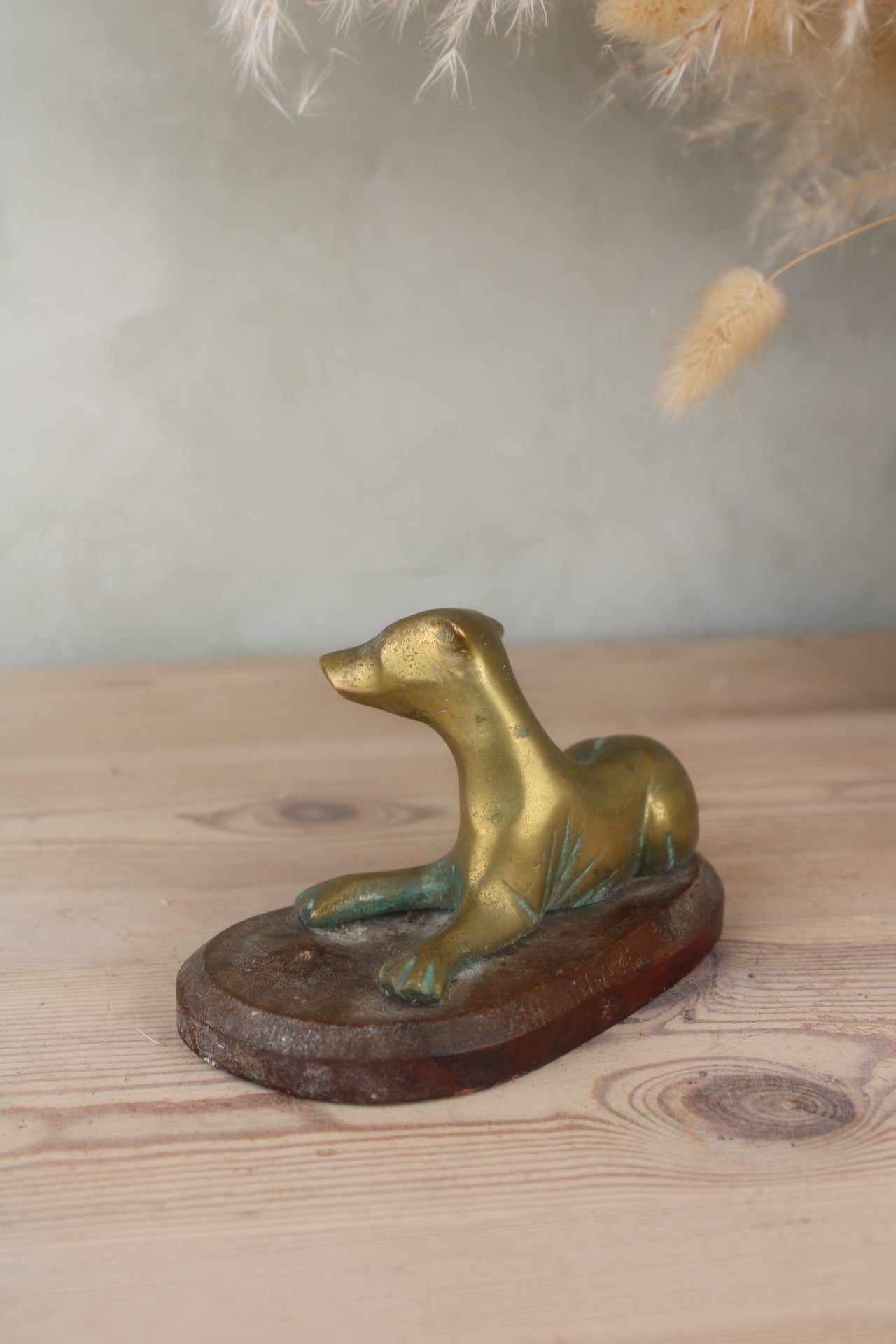 Brass Dog on a Wooden Base