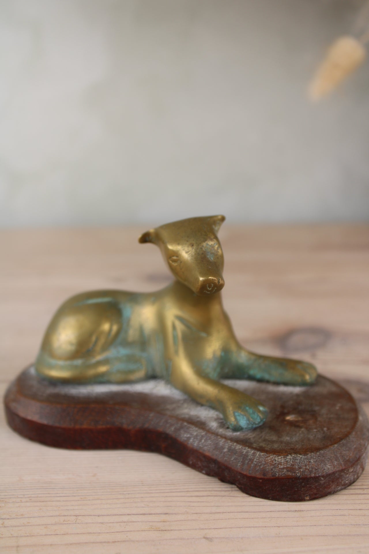 Brass Dog on a Wooden Base