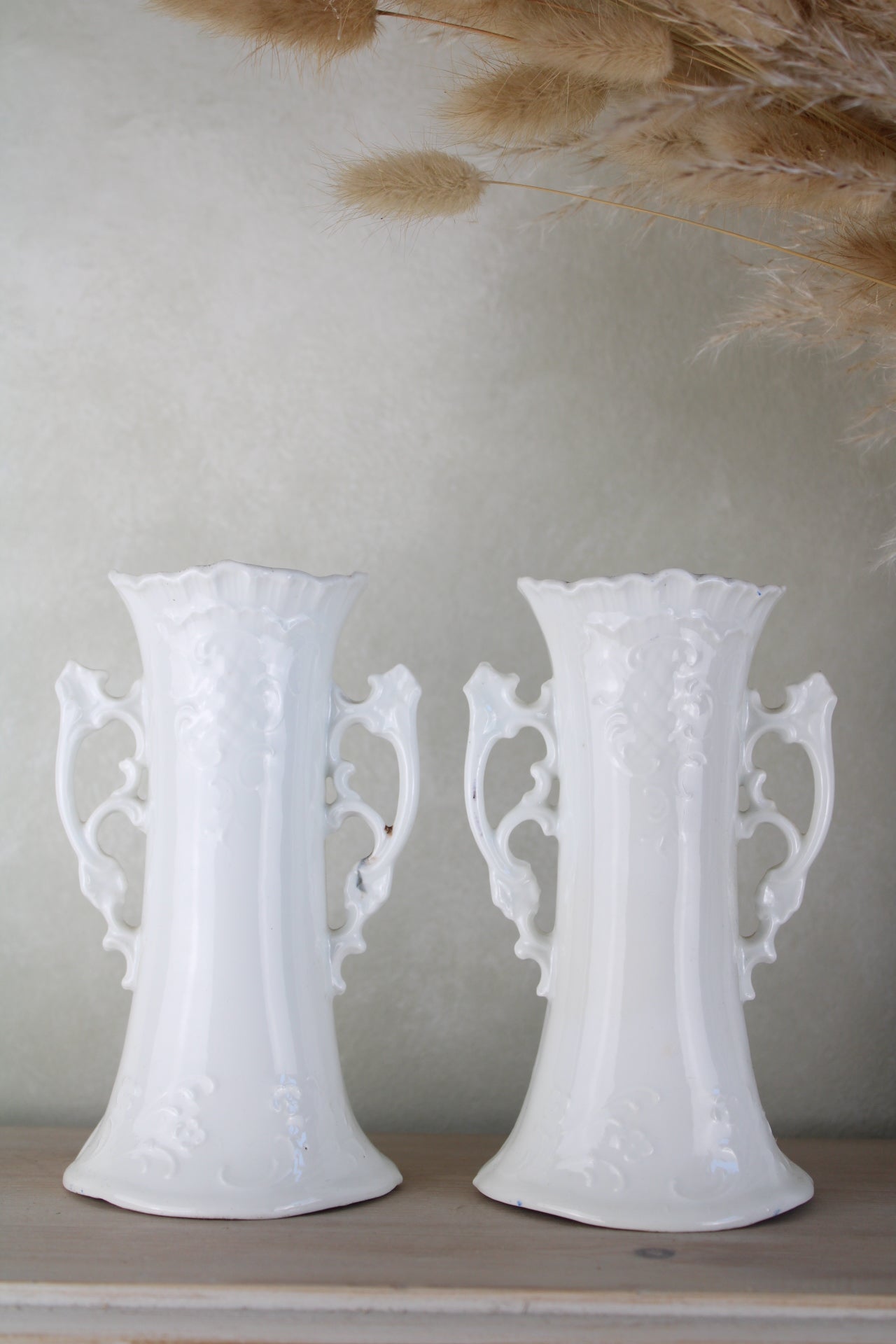 Pair of Cherub Design Vases