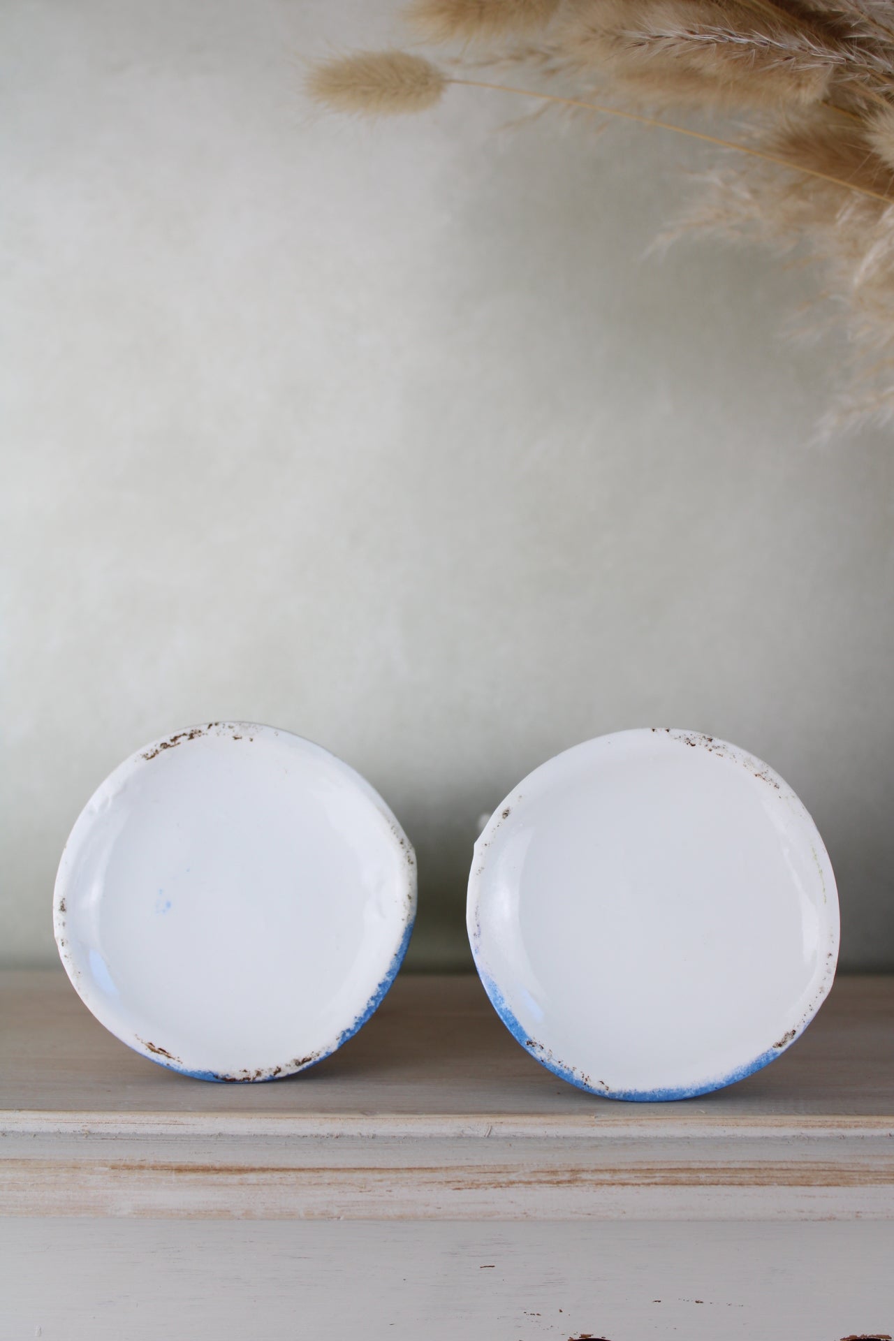 Pair of Cherub Design Vases
