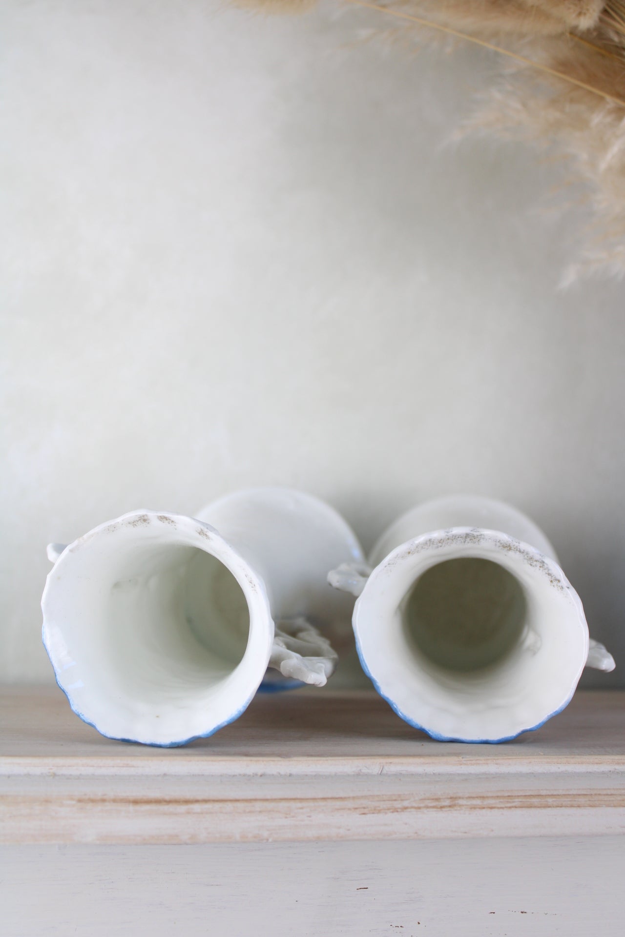 Pair of Cherub Design Vases