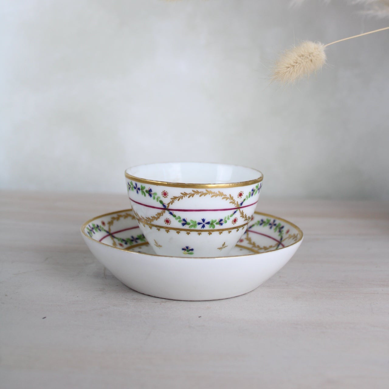 White and Gold Vintage Teacup and Saucer