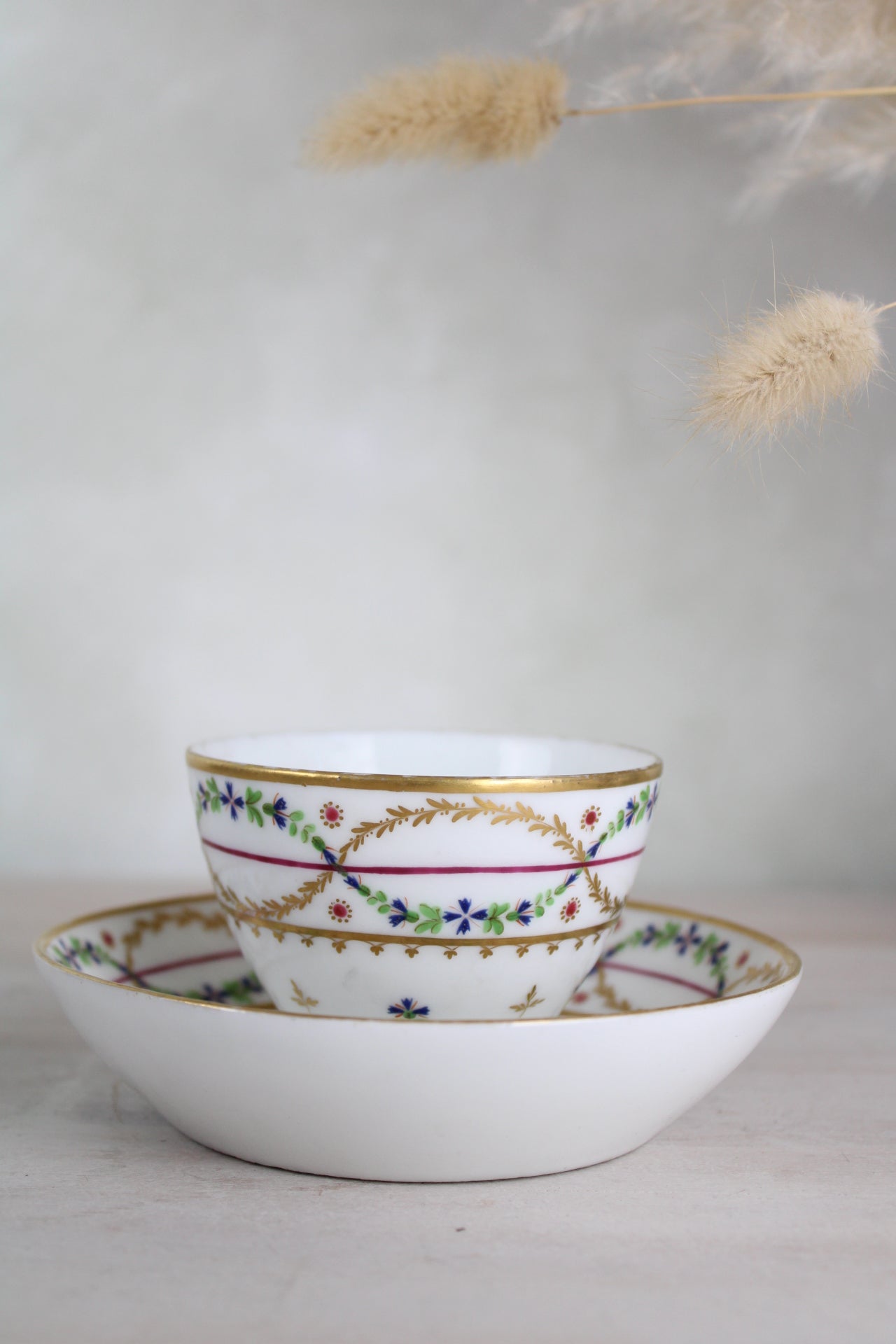 White and Gold Vintage Teacup and Saucer