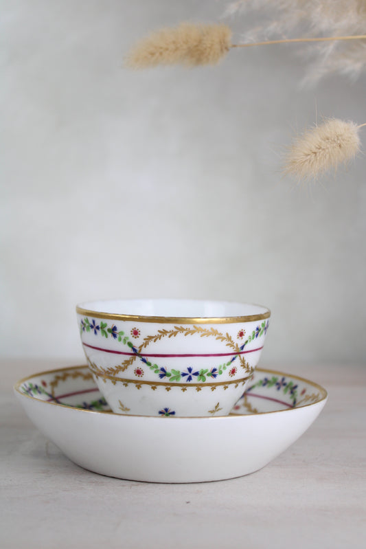 White and Gold Vintage Teacup and Saucer