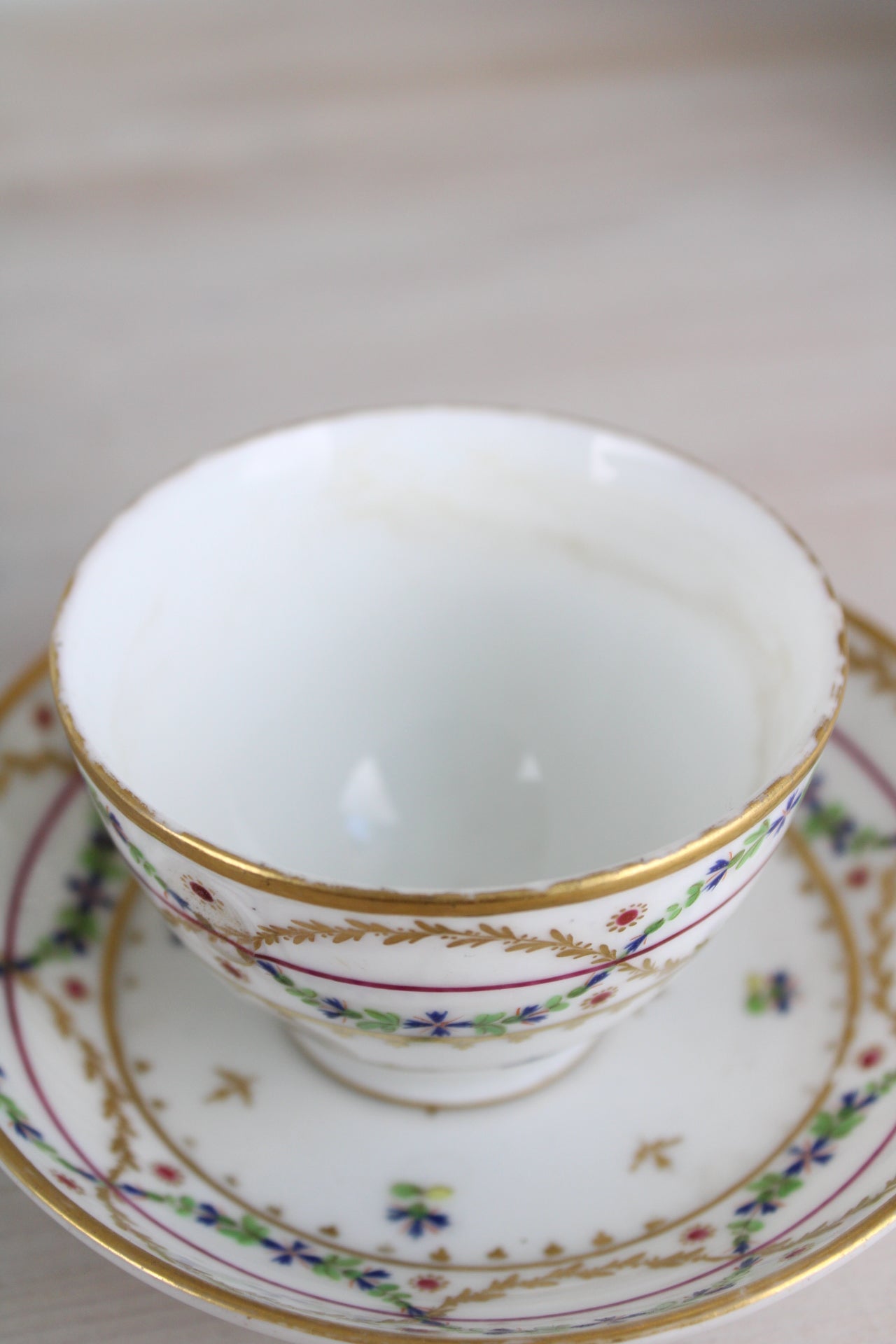 White and Gold Vintage Teacup and Saucer