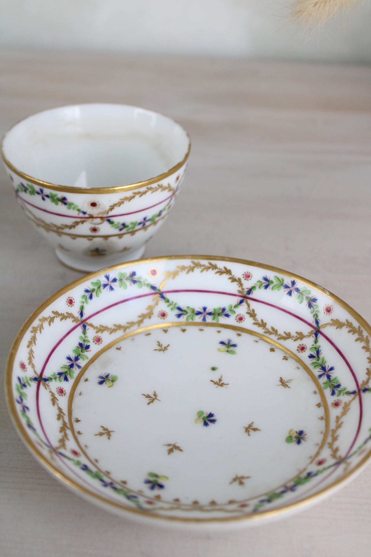 White and Gold Vintage Teacup and Saucer