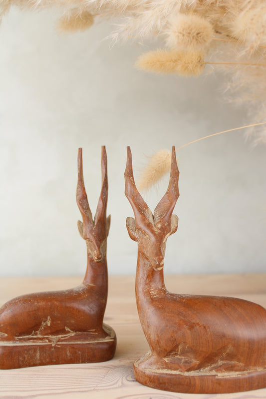 Pair of Sitting Wooden Stags