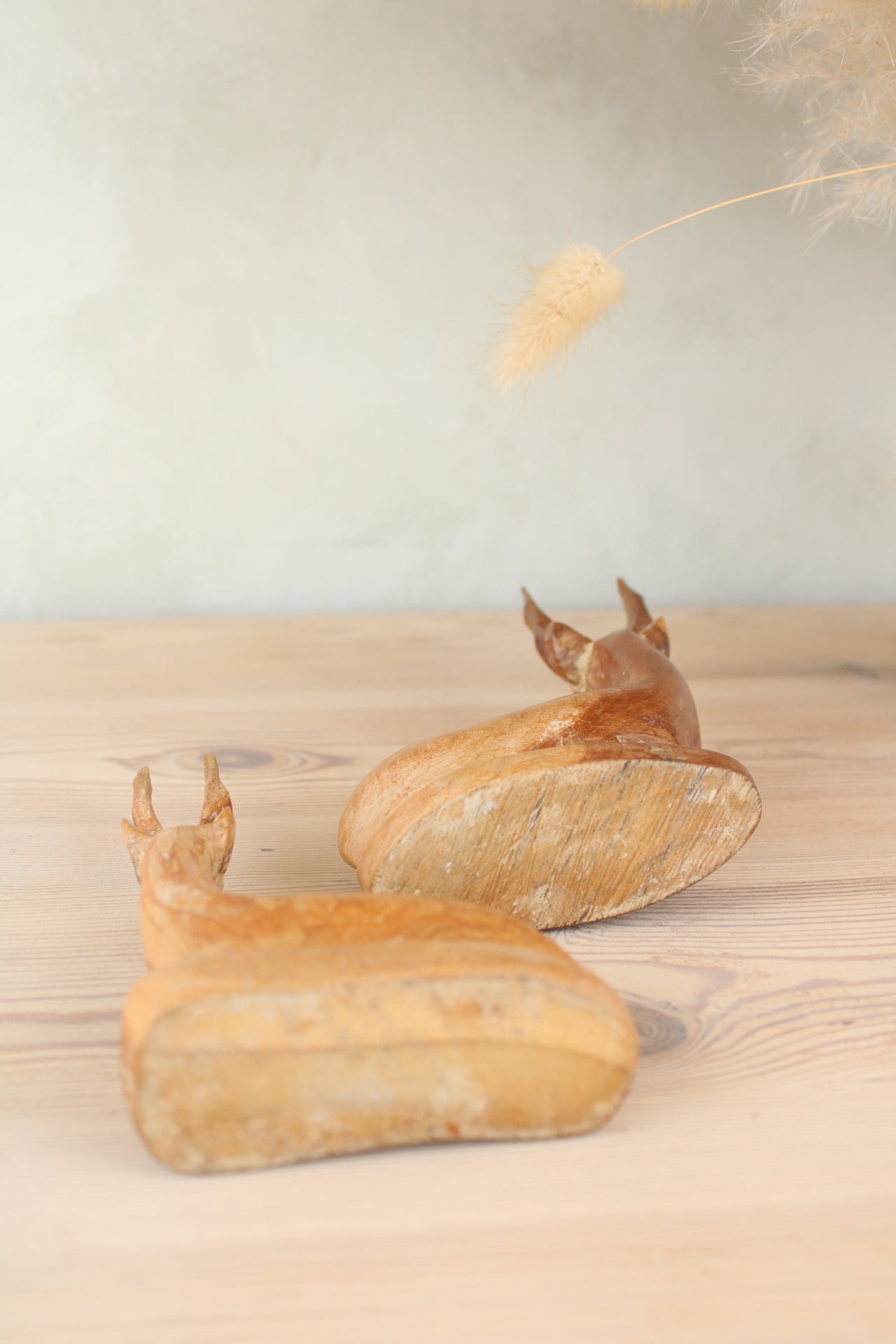 Pair of Sitting Wooden Stags
